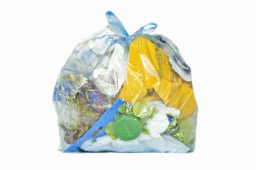 Sorting station showing separated recycling streams and containers